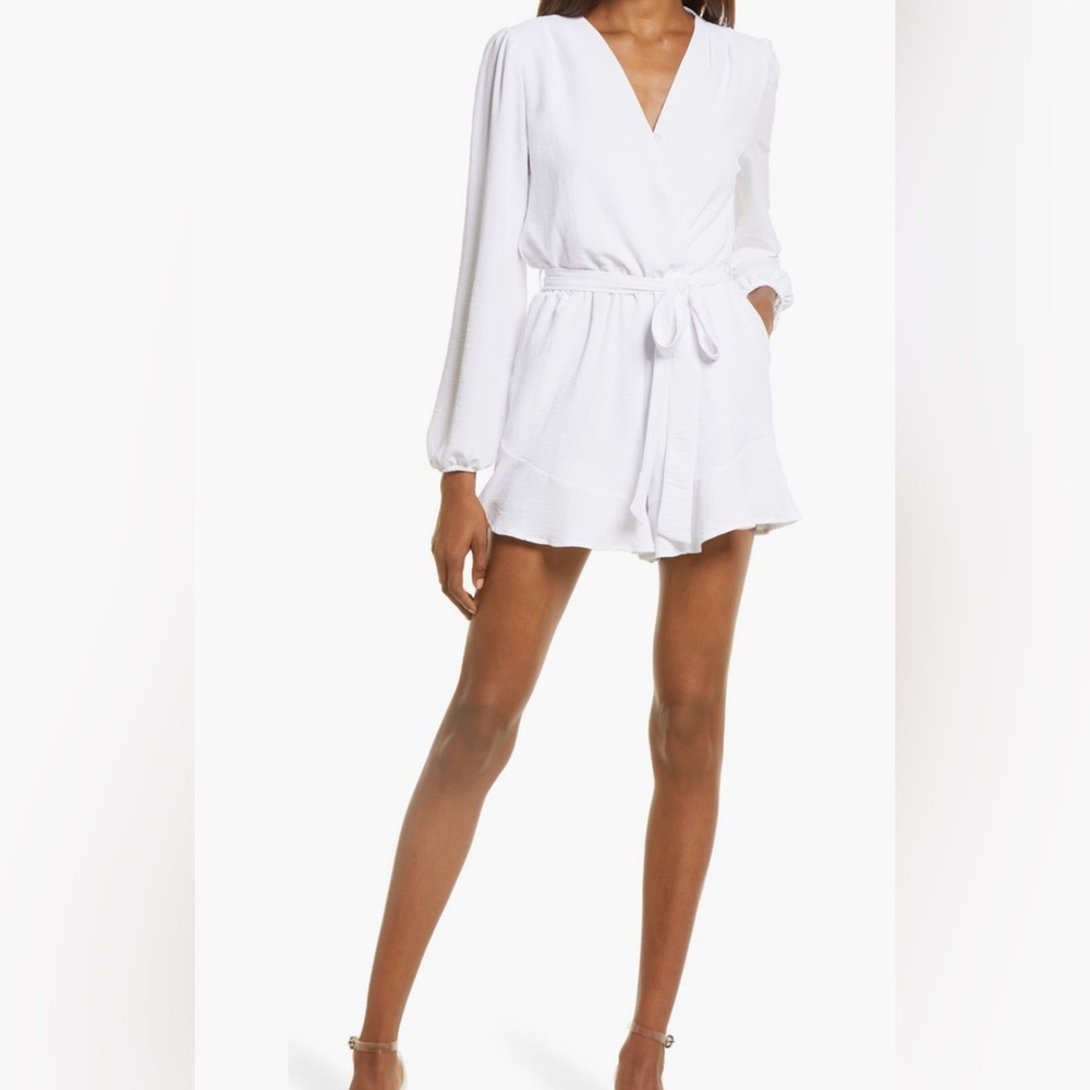 Flaired tie waist long sleeve romper